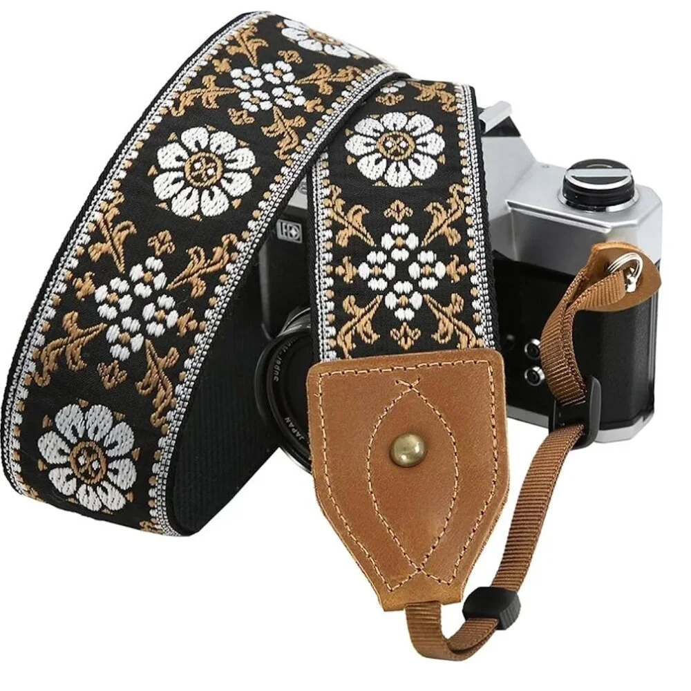 Canon EOS Rebel T7 with 2 lenses, vintage case, and strap
